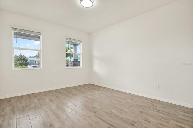 empty room featuring light hardwood / wood-style flooring