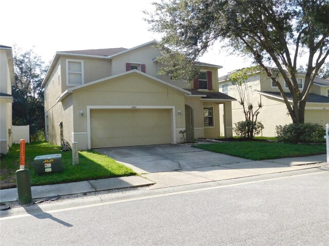 front of property featuring a front lawn