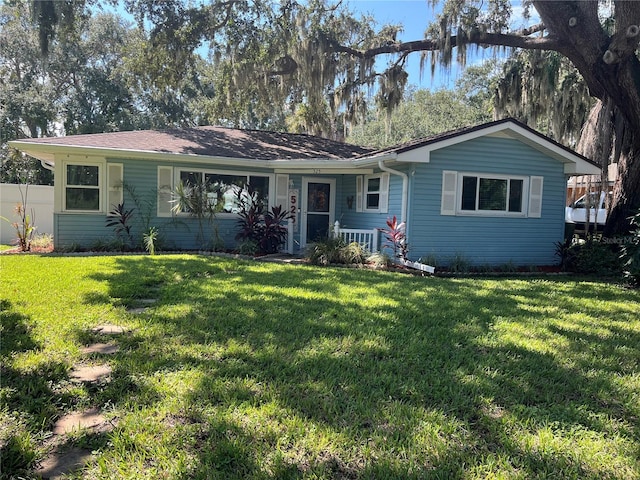 ranch-style house with a front yard