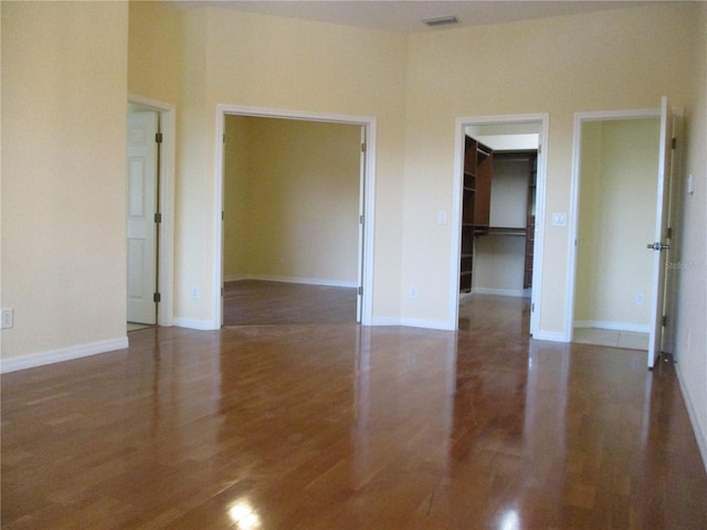 empty room featuring dark hardwood / wood-style floors