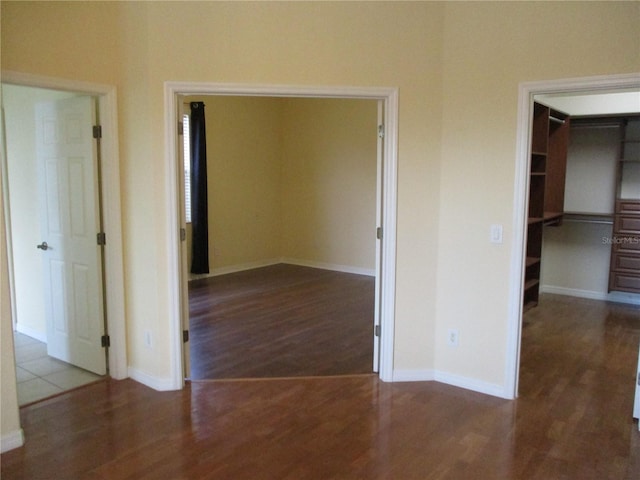 hallway featuring wood-type flooring