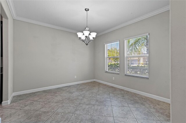 unfurnished room featuring light tile patterned flooring, a chandelier, and ornamental molding