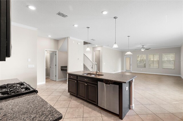 kitchen with ceiling fan, sink, dishwasher, and an island with sink