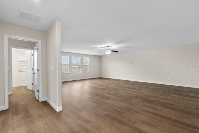 unfurnished room featuring ceiling fan and wood-type flooring