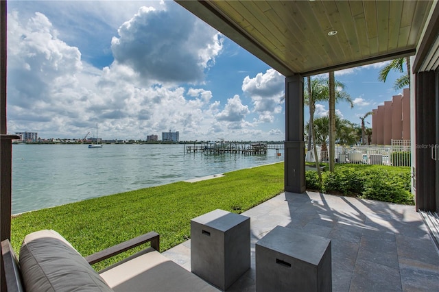 view of patio featuring a water view