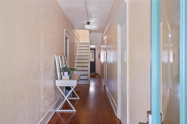 hallway with dark wood-type flooring