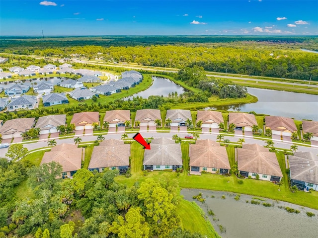 drone / aerial view featuring a water view