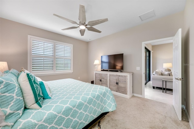 carpeted bedroom with ceiling fan