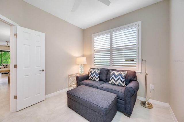 living room featuring ceiling fan