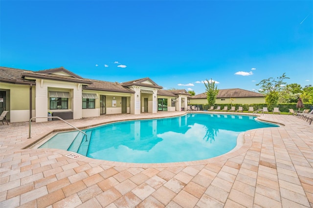 view of pool with a patio