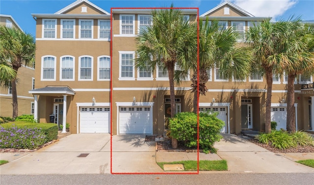 view of property with a garage