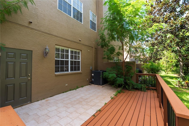 deck featuring a patio area and central AC