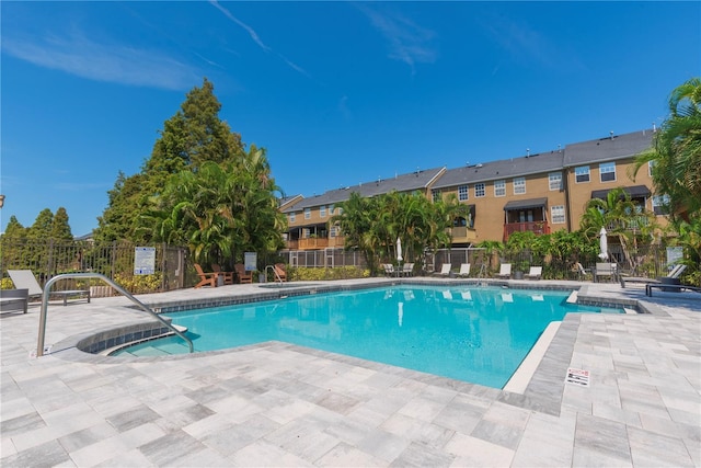 view of pool featuring a patio area