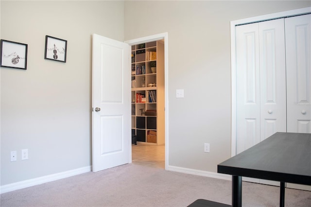 unfurnished office with light colored carpet