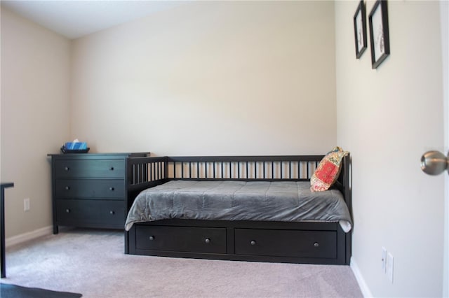 bedroom with light carpet