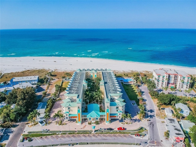 aerial view with a view of the beach and a water view