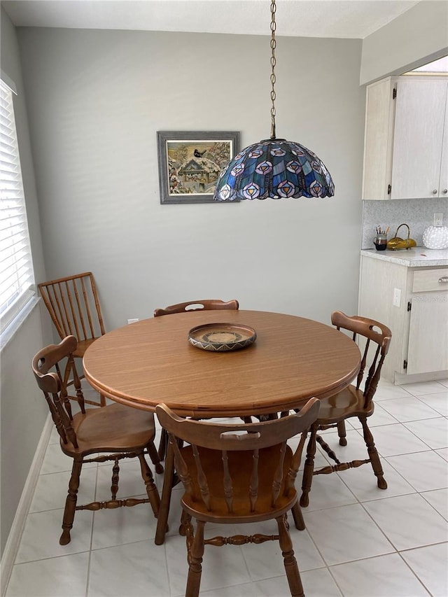 view of tiled dining space