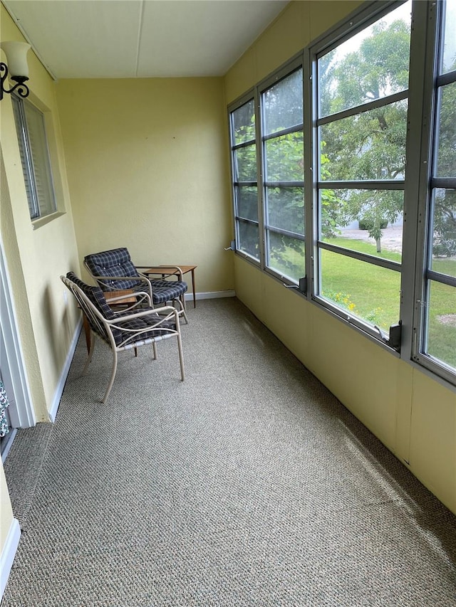 unfurnished sunroom featuring plenty of natural light