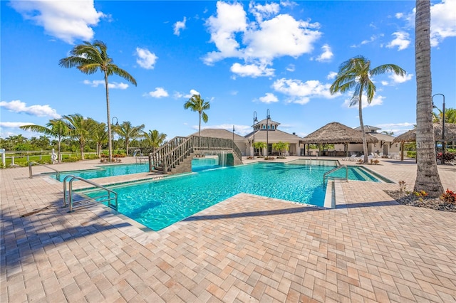 view of pool featuring a patio