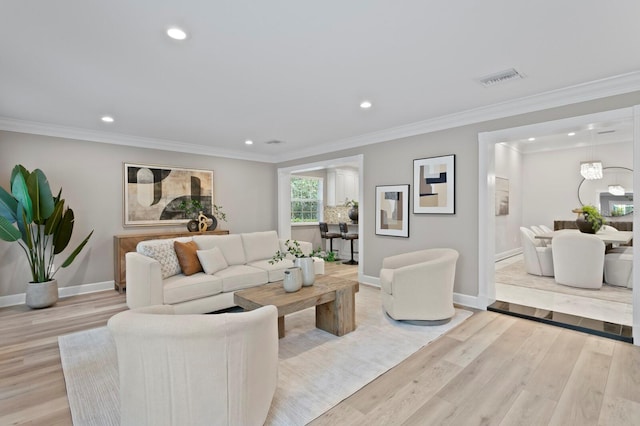 45 Adalia Ave, Tampa, FL 33606 - living area featuring recessed lighting, baseboards, light wood-type flooring, and ornamental molding