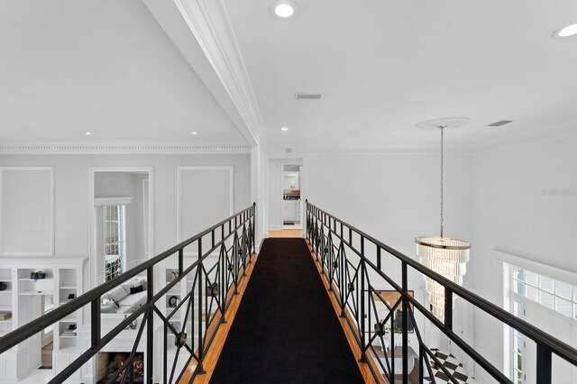 45 Adalia Ave, Tampa, FL 33606 - hallway featuring crown molding, healthy amount of natural light, and recessed lighting
