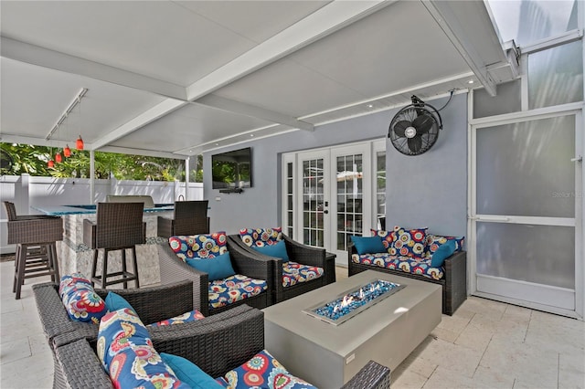 45 Adalia Ave, Tampa, FL 33606 - view of patio with an outdoor living space with a fire pit, french doors, and fence