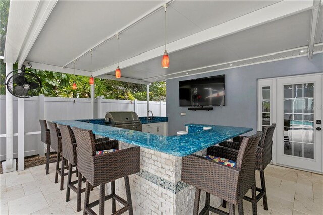 45 Adalia Ave, Tampa, FL 33606 - view of patio / terrace with a grill, fence, and exterior kitchen