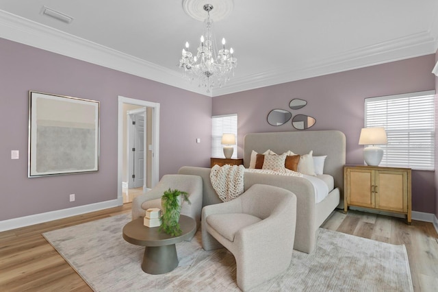 45 Adalia Ave, Tampa, FL 33606 - bedroom featuring a chandelier, crown molding, light wood-style floors, and baseboards