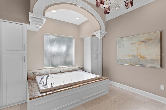45 Adalia Ave, Tampa, FL 33606 - bathroom with a whirlpool tub, baseboards, decorative columns, crown molding, and recessed lighting