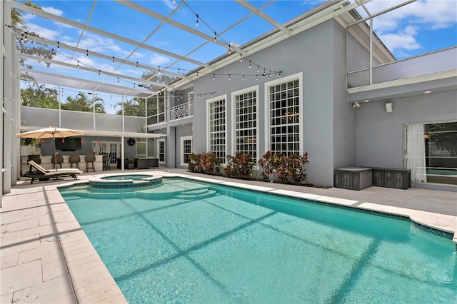 45 Adalia Ave, Tampa, FL 33606 - view of pool with a patio, a pool with connected hot tub, and a lanai