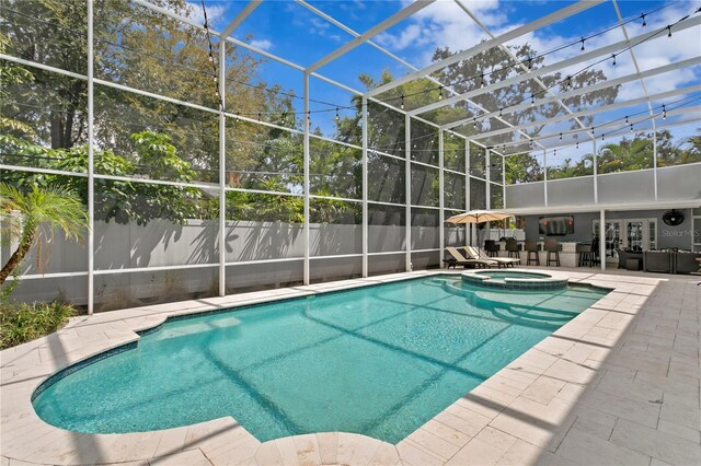 45 Adalia Ave, Tampa, FL 33606 - view of pool with a patio, a lanai, a pool with connected hot tub, and fence