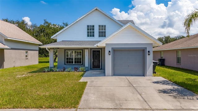 view of front of property featuring a front lawn and a garage