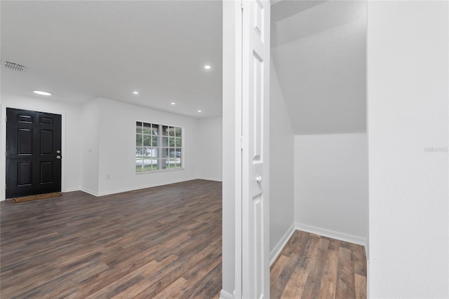 interior space with dark wood-type flooring