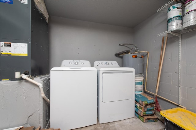 laundry area with independent washer and dryer