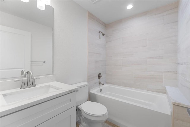 10061 Gulfstream Blvd, Englewood, FL 34224 - full bathroom with toilet, shower / tub combination, vanity, and recessed lighting