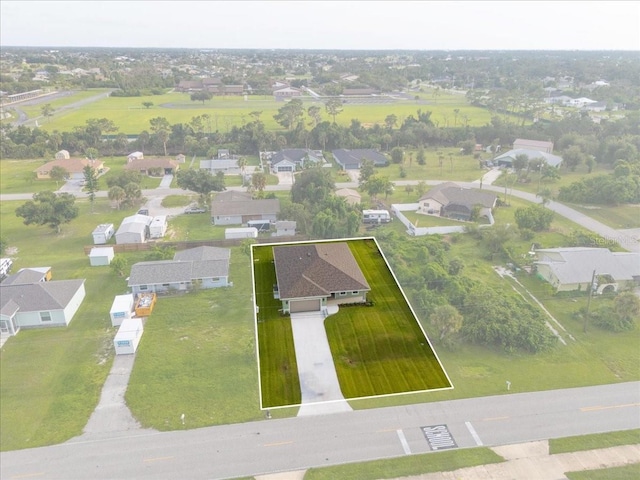10061 Gulfstream Blvd, Englewood, FL 34224 - aerial view of property and surrounding area with property boundaries highlighted and nearby suburban area