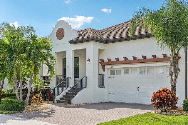 view of front of home with a garage