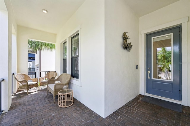 entrance to property with a porch