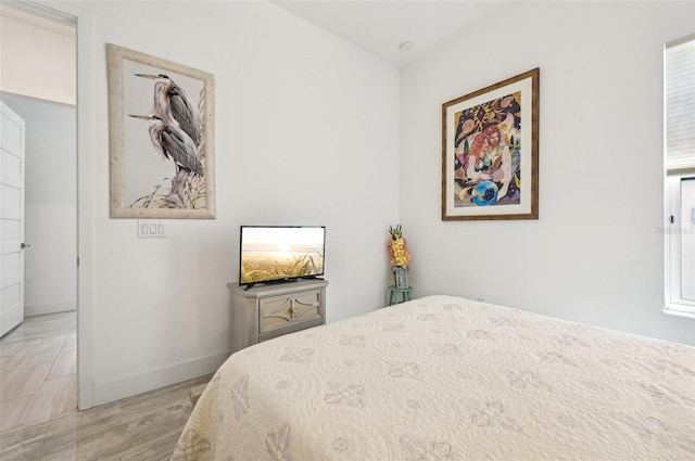 bedroom with light hardwood / wood-style flooring