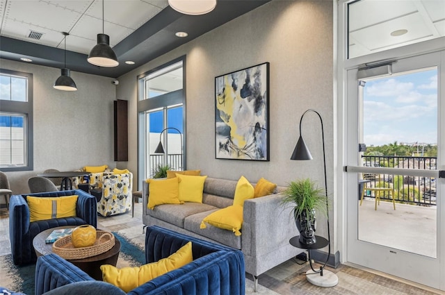 living room featuring plenty of natural light and hardwood / wood-style floors