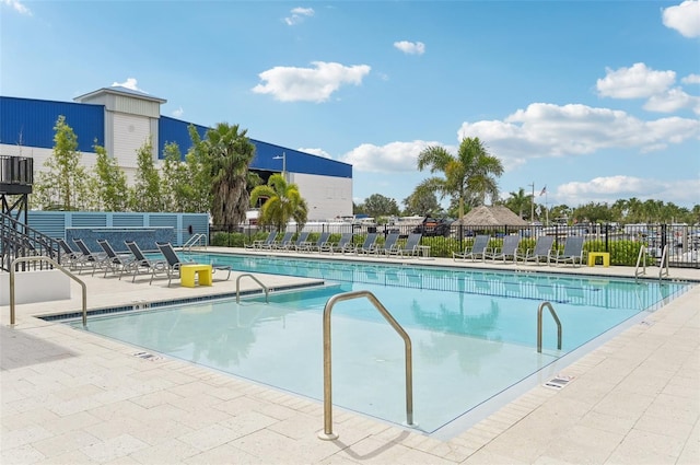 view of pool featuring a patio area