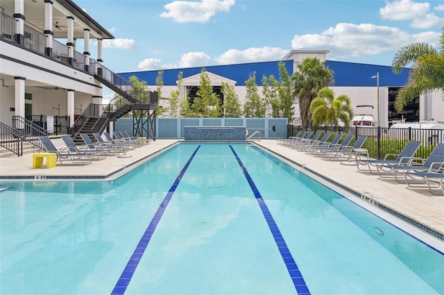 view of pool featuring a patio