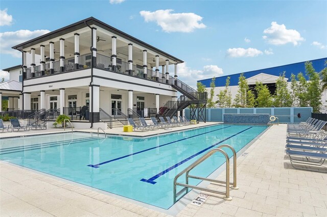 view of pool featuring a patio area