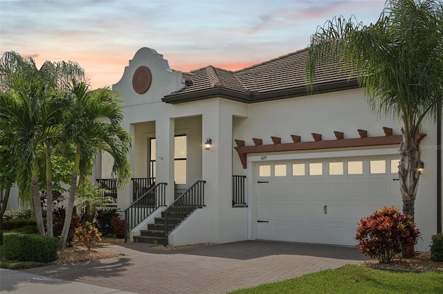 view of front of home with a garage