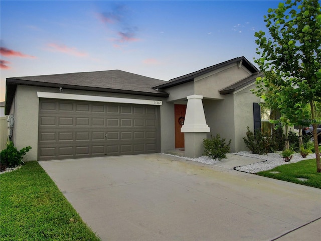 view of front of home with a garage