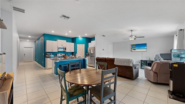 dining area with recessed lighting, light tile patterned floors, visible vents, and ceiling fan