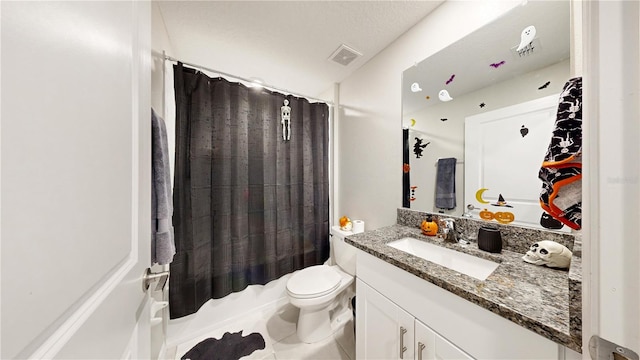 full bathroom with toilet, tile patterned floors, vanity, and shower / tub combo with curtain