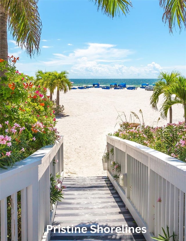 property view of water featuring a beach view