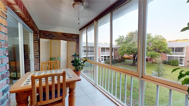 sunroom / solarium featuring plenty of natural light