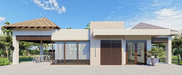 5514 Laguna Caribe Cir Unit 108, Fort Myers, FL 33905 - back of house featuring a patio area and stucco siding